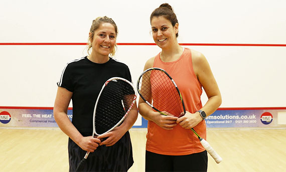 Two female British Open Masters players standing on a squash court